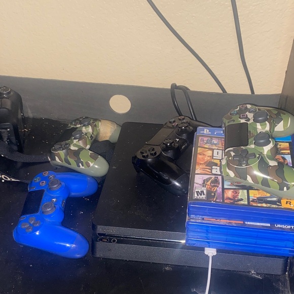 Sony Other - Sony Console with Black, Blue, and Camouflage Controllers
